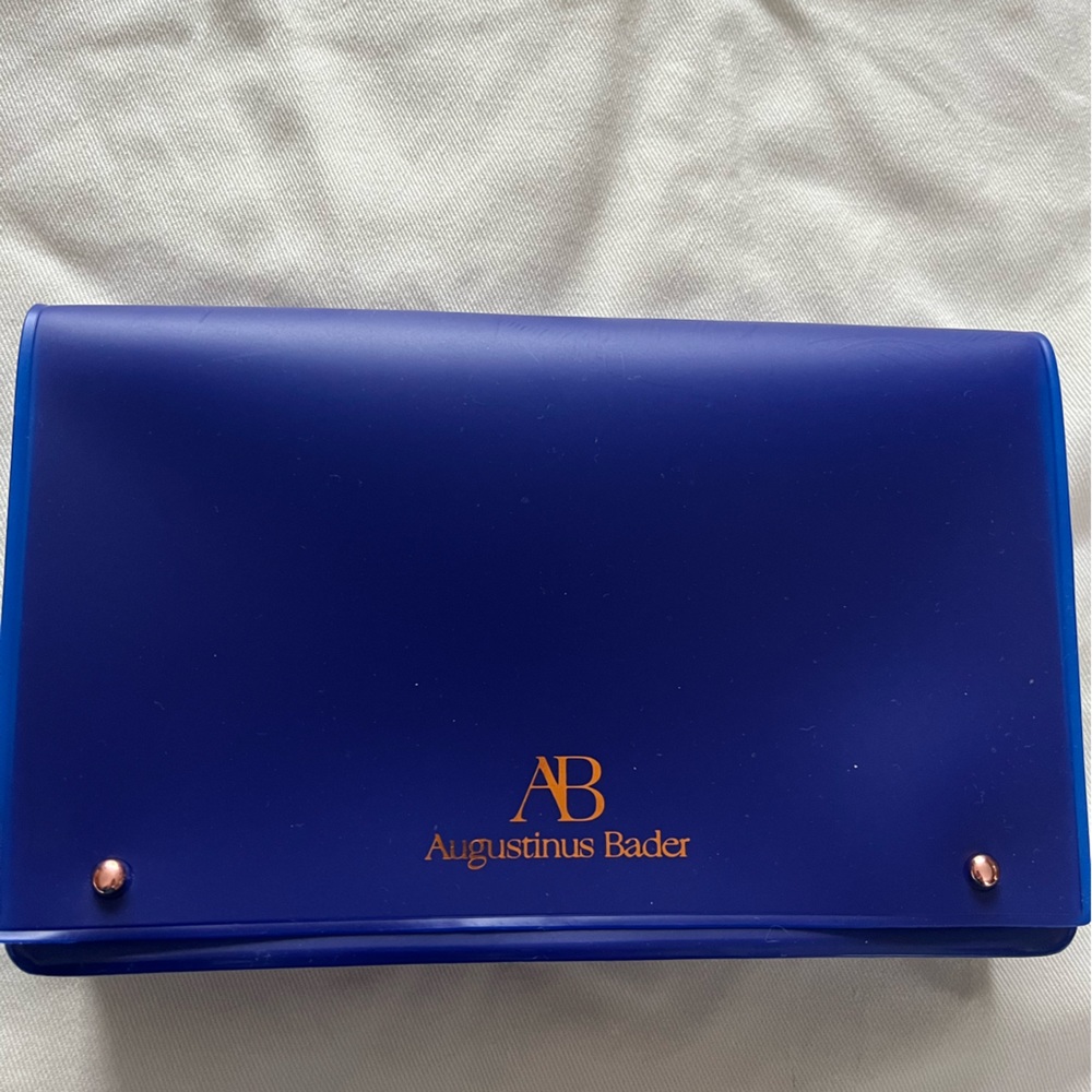 Augustinus Bader blue cosmetic pouch